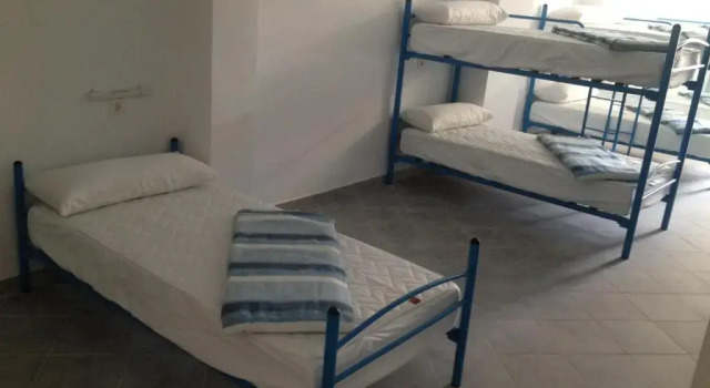 Кровать в общем номере Albergue @ Muxia