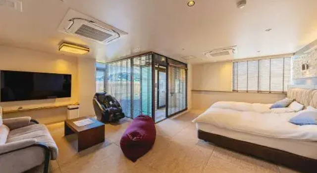 Кровать в общем номере Ryokan Ginrinso Kotobuki