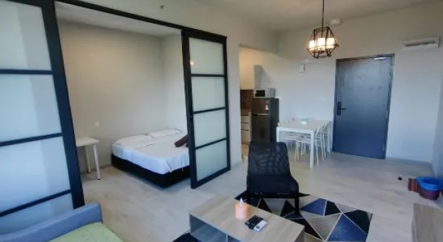 Апартаменты Jesselton Quay Suites