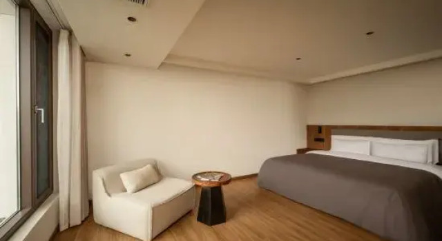 Семейный люкс с 2 комнатами с видом на сад Yunqi Dali Sea View Hotel