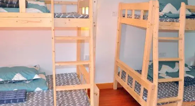 Кровать в общем номере с видом на море Miaoji Seaview Guesthouse