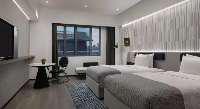 Wanda Moments - Suzhou Kejicheng, Rezerwuj Hotel Hotele 3-gwiazdkowe w Sangshubang, 3*
