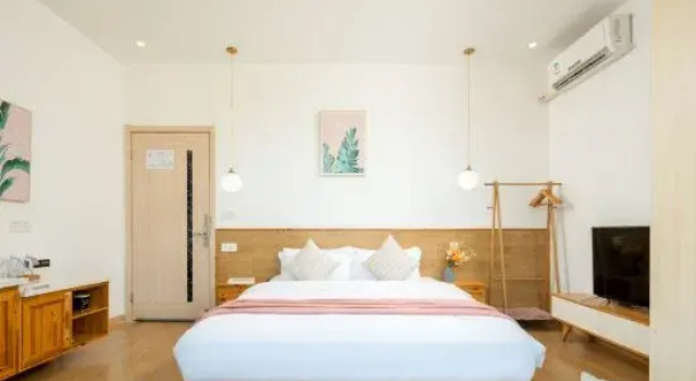 Кровать в общем номере Floral Hotel· Yiding cottage Hotel (riverside Dingba store)