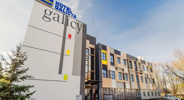 Кровать в общем номере Hotel Galicya