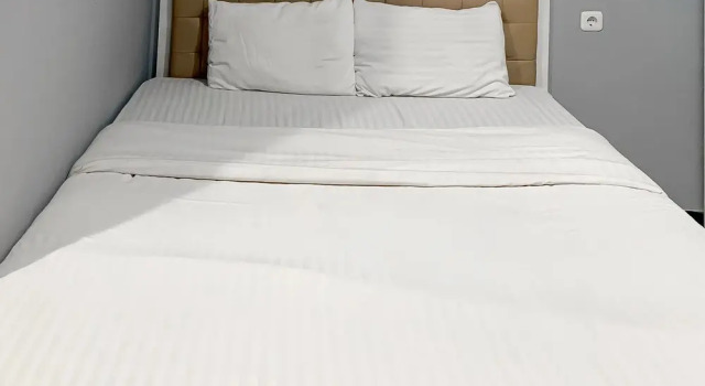Standard Zimmer Karins Guesthouse Syariah RedPartner