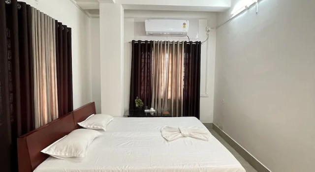 Deluxe quadruple chambre avec balcon USC Homestay