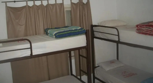 Кровать в общем номере Hotel Pousada Clínicas Valente
