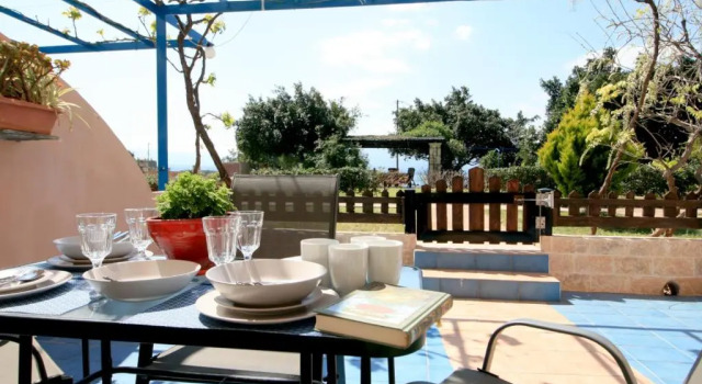 Seaside, relaxing family house with playground! Villa Lavrys 4, Забронировать Вилла Отели Марати с парковкой, Парковка