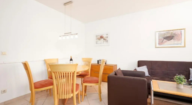Seepark Wohnung 2 10, Забронировать Отель Шарбойц Holstein Switzerland, рядом с Пляж Hundestrand
