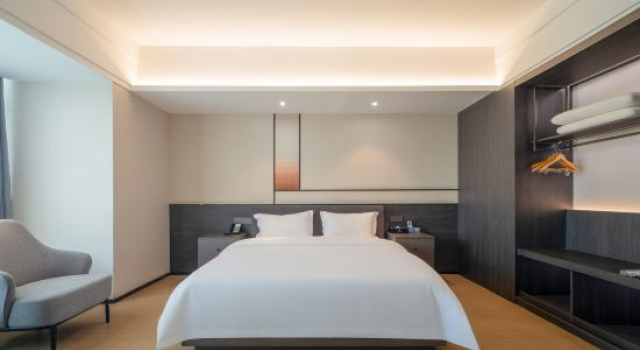 Люкс Deluxe Liangde Hotel (Shenzhen Shajing Houting Subway Station)