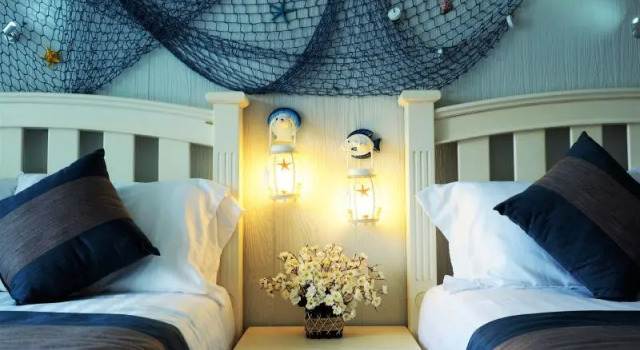 Кровать в общем номере Ancora Blu Boutique Hotel