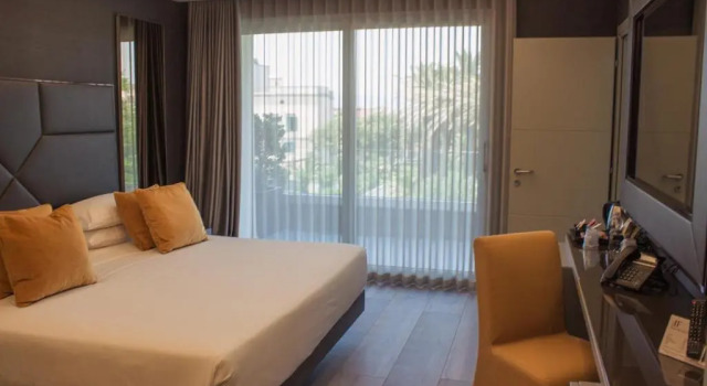 Четырёхместный номер Luxury Hotel & Resort Tre Fontane Luxury