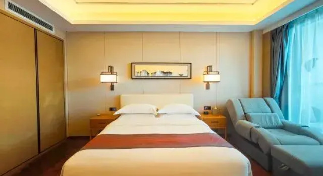 Семейный люкс Qing Hua Hai Guan Fang Garden Hotel