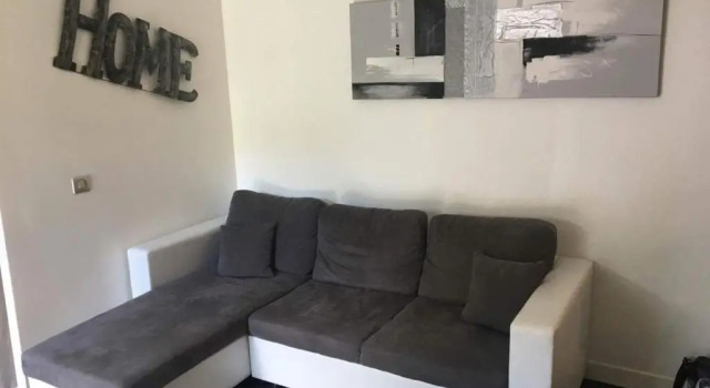 Апартаменты Appartement avec jardin et parking