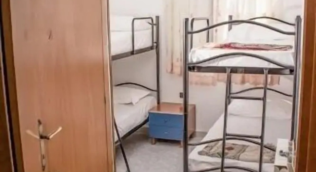 Кровать в общем номере с 2 комнатами Melting Pot Rome
