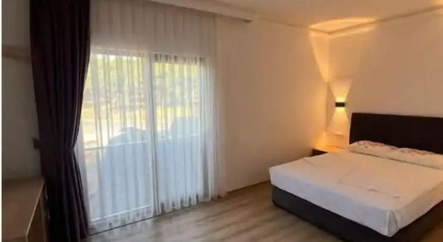 Номер Deluxe Asimado Suit Hotel