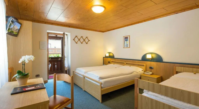 Hotel Garnì Ai Serrai, Забронировать Отель Рокка-Пьеторе Чиветта