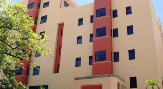 Кровать в общем номере Hotel Olmeca Plaza