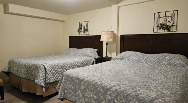 Standard quadruple famille chambre Swiss Chalets Motel