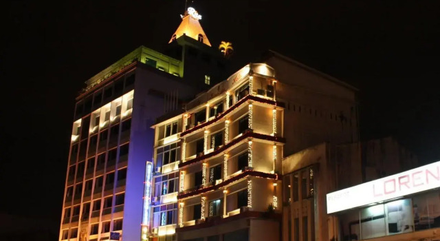 Кровать в общем номере Ritz Garden Hotel Ipoh