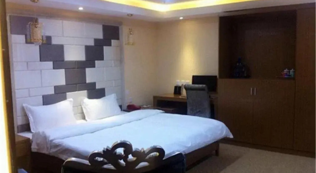 Zhangye Huishang Business Hotel, Varaa Hotelli Zhangye Gansu