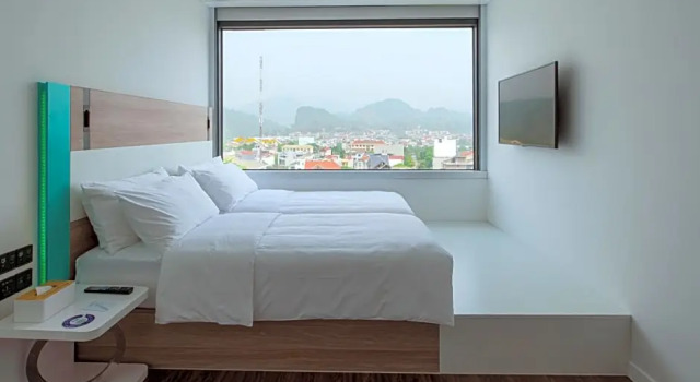 Номер Deluxe Tru by Hilton Hoa Binh City Centre