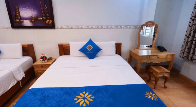 Четырёхместный номер Standard COZY Hotel HCM