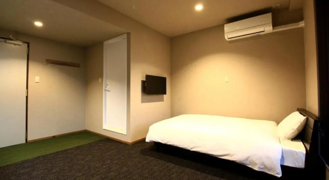 Номер Deluxe KANEMITSU CAPITAL HOTEL