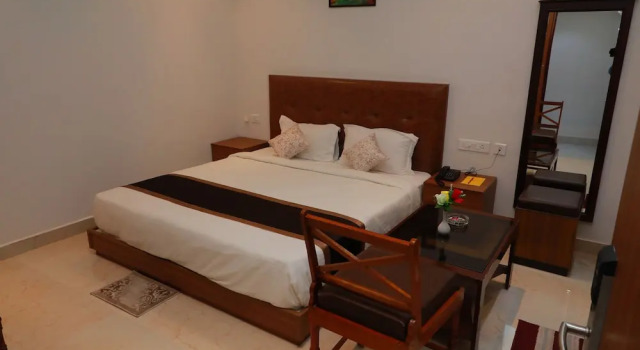 Номер Deluxe TM INN Hotel