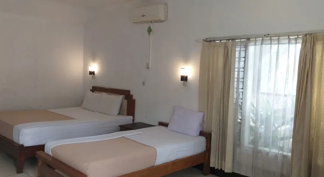 Camera tripla familiare Standard Intan Hotel Purwakarta