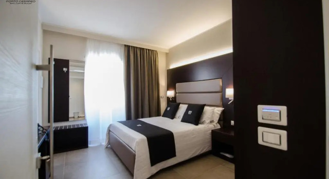 Четырёхместный номер Deluxe Porto Cesareo Exclusive Room