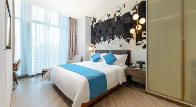 Семейный люкс с 3 комнатами Dongguan Shan Zhi Ye Serviced Apartment Hotel - Houjie Wanda Plaza Liaoxia Subway Station