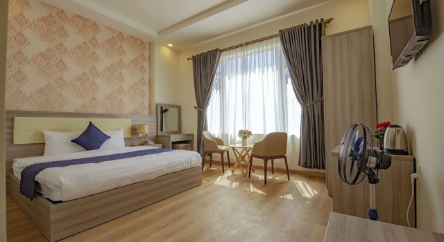 Номер Deluxe Khánh Uyên 1 Hotel