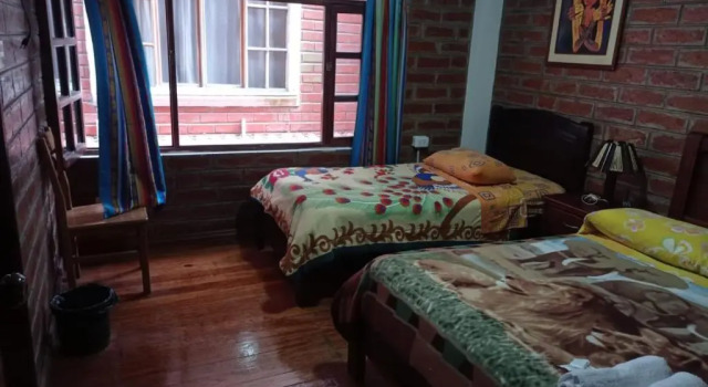Четырёхместный номер Standard с красивым видом из окна Hostal D´Mathias