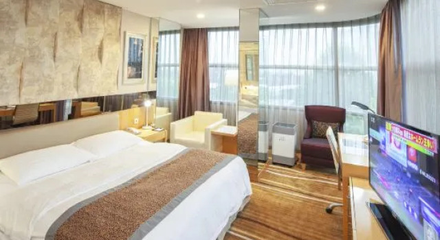 Номер Deluxe Beijing Guangming Hotel