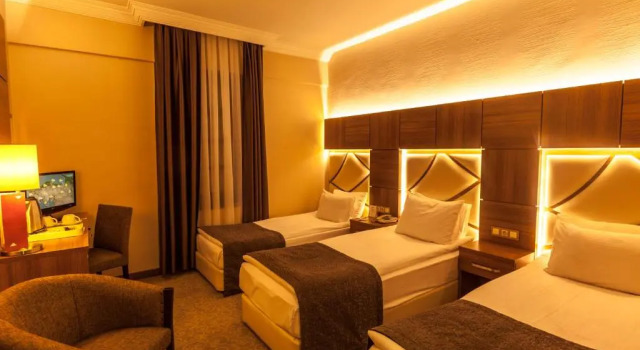 Трёхместный номер Rumi Hotel