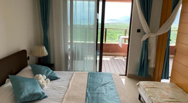 Marcia's Guest House, Boek Pension Wanning Hainan