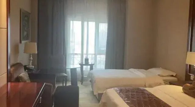 Семейный номер Deluxe Qingdao Huaxi Hotel