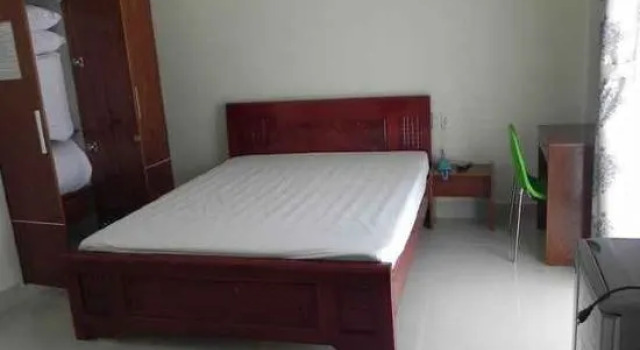 Четырёхместный номер Standard с балконом и с красивым видом из окна Kim Nhung Hotel