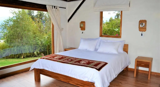 Standaard Driepersoonskamer uitzicht op de tuin Ilatoa Lodge