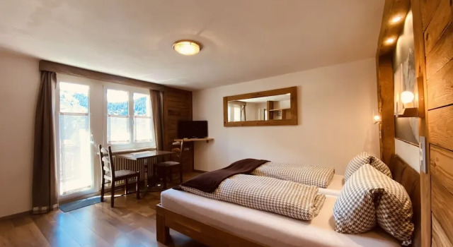 Четырёхместный номер Standard Mountain Lodge Sedrun