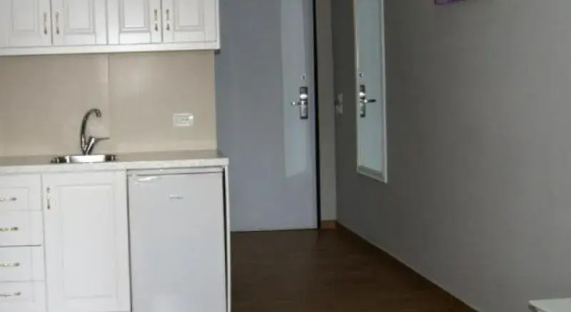Трёхместный номер Standard Цокольный этаж с балконом Apartments Flower Residence