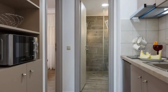Семейный люкс Цокольный этаж c 1 комнатой с видом на бассейн Panorama Hotel Apartments