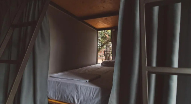 Кровать в общем номере Laika Hostel