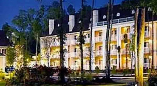 Кровать в общем номере Palmera Inn and Suites