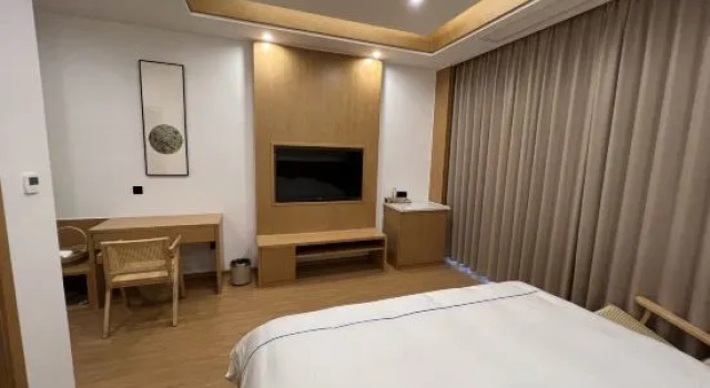 Люкс Fuyang Qijiang Bieyuan High-end Homestay (Raozhou Ancient Town Branch)
