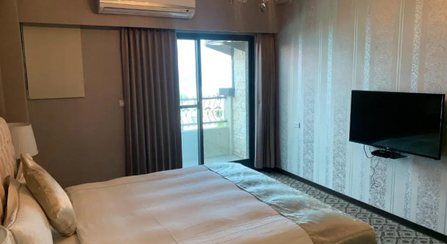 Номер Deluxe Chi Shing Hai Hotel