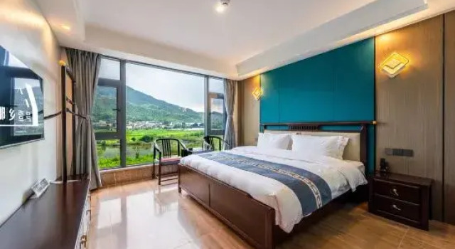 Кровать в общем номере Naxiang No.1 Family Holiday Homestay (Anji Yunshang Grassland Branch)
