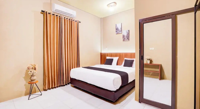 Номер Standard Collection O Padang City Center Near Transmart Padang Formerly De Orchids