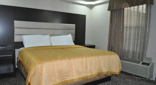 Downtown Suites Dallas, Забронировать Мини-отель Даллас Dallas - Fort Worth Metropolitan Area